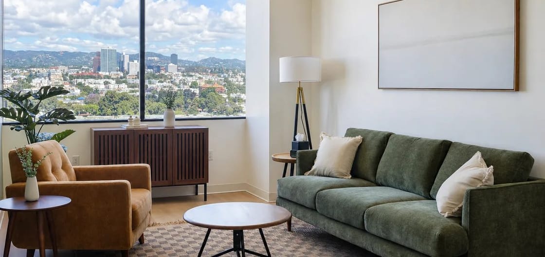 Therapy office interior at Olida's West LA - Olympic location, with a city skyline view